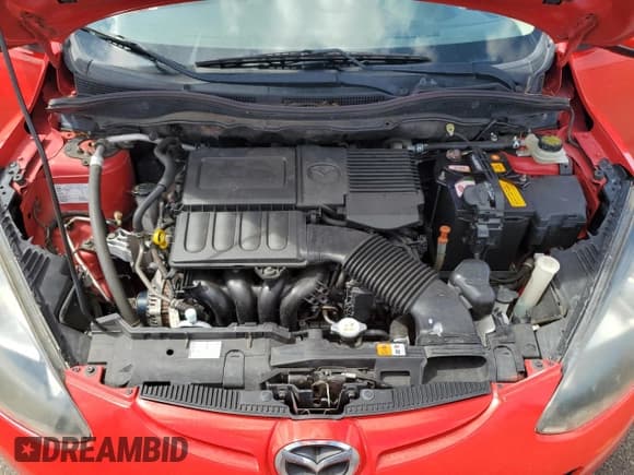 ✅ 2012 Mazda 2 Sport • VIN: JM1DE1KY8C0141074 • Лот: 62145534. Опубликован ранее на Copart с пробегом 116 998 миль. Бесплатный доступ к архиву аукционных продаж из США и подробный отчёт об истории автомобиля на DreamBid. Изображение 11.