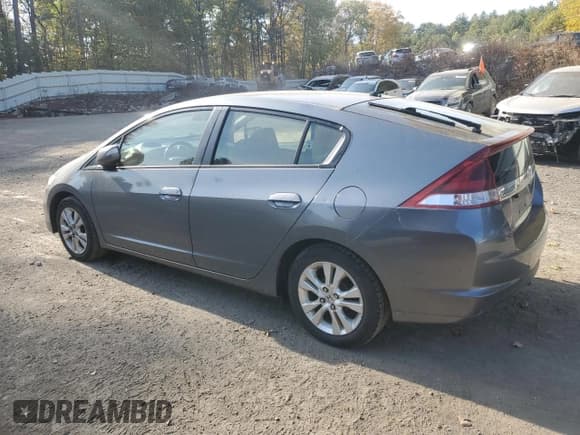 ✅ 2014 Honda Insight EX • VIN: JHMZE2H77ES001534 • Лот: 73818524. Опубликован ранее на Copart с пробегом 198 551 миль. Бесплатный доступ к архиву аукционных продаж из США и подробный отчёт об истории автомобиля на DreamBid. Изображение 2.