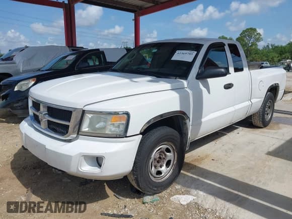✅ 2010 Dodge Dakota ST • VIN: 1D7CW2BKXAS143412 • Лот: 42369705. Опубликован ранее на IAAI с пробегом 244 236 миль. Бесплатный доступ к архиву аукционных продаж из США и подробный отчёт об истории автомобиля на DreamBid. Изображение 2.