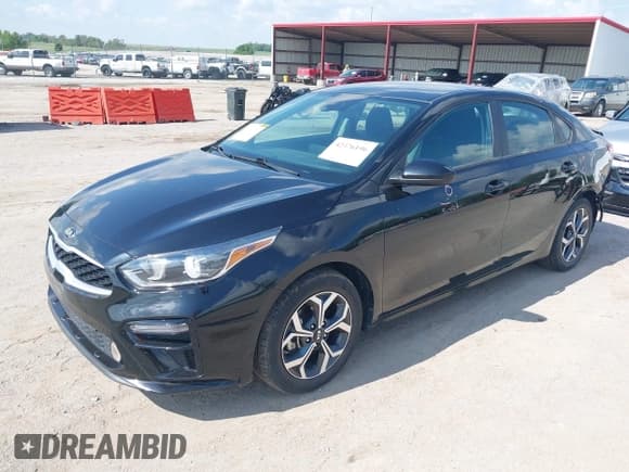 ✅ 2021 Kia Forte LXS • VIN: 3KPF24AD6ME287337 • Lot: 42376196. Listed on IAAI with 31,406 mi. Free auction sales archive from the USA and detailed vehicle history report at DreamBid. Image 2.