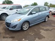✅ 2012 Mazda 5 Touring • VIN: JM1CW2CL2C0130024 • Lot: 43020154. Listed on IAAI with 145,905 mi. Free auction sales archive from the USA and detailed vehicle history report at DreamBid. Image 2.