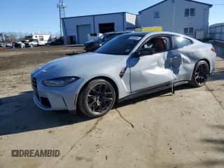 ✅ 2022 BMW M4 • VIN: WBS53AZ05NCK13109 • Lot: 43600854. Listed on Copart with 12,285 mi. Free auction sales archive from the USA and detailed vehicle history report at DreamBid. Image 1.