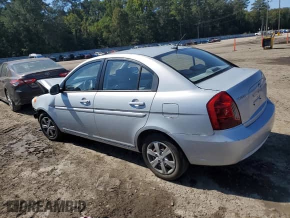 2010 Hyundai Accent GLS with VIN KMHCN4AC4AU495212, listed as a Copart auction lot 82365635 with 134,785 mi miles and Salvage title. Bid and sale history available at DreamBid. Image 2.