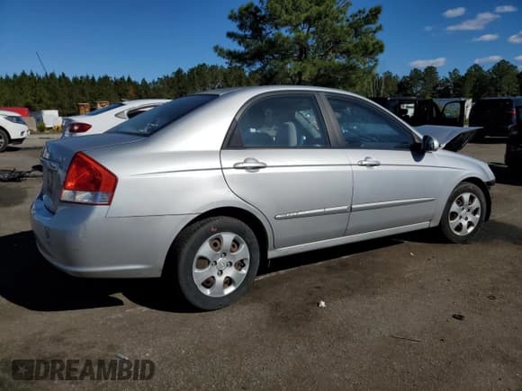✅ 2009 Kia Spectra LX • VIN: KNAFE221295605504 • Lot: 92089535. Listed on Copart with 150,112 mi. Free auction sales archive from the USA and detailed vehicle history report at DreamBid. Image 3.