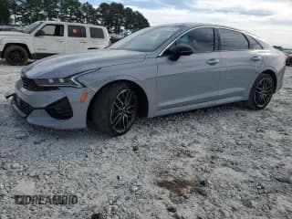 ✅ 2024 Kia K5 GT • VIN: 5XXG44J84RG235768 • Lot: 85315105. Wystawiony na Copart z przebiegiem 23 305 mil. Bezpłatny archiwum sprzedaży aukcyjnych z USA i szczegółowy raport historii pojazdu na DreamBid. Zdjęcie 1.