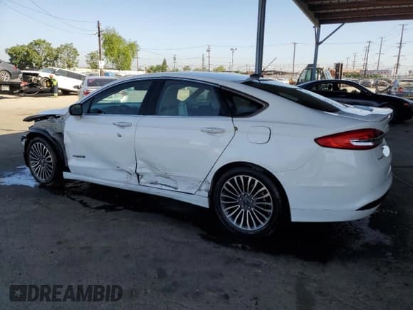 ✅ 2017 Ford Fusion Hybrid Titanium • VIN: 3FA6P0RUXHR234093 • Lot: 57997865. Wystawiony na Copart z przebiegiem 124 862 mil. Bezpłatny archiwum sprzedaży aukcyjnych z USA i szczegółowy raport historii pojazdu na DreamBid. Zdjęcie 2.