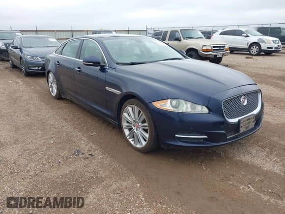✅ 2015 Jaguar XJ Portfolio • VIN: SAJWA2GZ7F8V90474 • Lot: 42449952. Listed on IAAI with 48,487 mi. Free auction sales archive from the USA and detailed vehicle history report at DreamBid. Image 1.