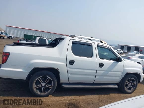 ✅ 2014 Honda Ridgeline Sport • VIN: 5FPYK1F76EB014797 • Лот: 43151556. Опубликован ранее на IAAI с пробегом 94 345 миль. Бесплатный доступ к архиву аукционных продаж из США и подробный отчёт об истории автомобиля на DreamBid. Изображение 13.