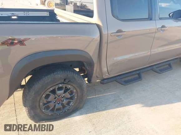 ✅ 2023 Nissan Frontier Pro-4X • VIN: 1N6ED1EK4PN674379 • Lot: 43437360. Listed on IAAI with 24,855 mi. Free auction sales archive from the USA and detailed vehicle history report at DreamBid. Image 6.
