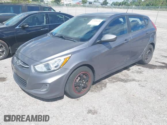 2015 Hyundai Accent GS with VIN KMHCT5AE6FU218002, listed as a IAAI auction lot 43408428 with 164,026 mi miles and . Bid and sale history available at DreamBid. Image 2.