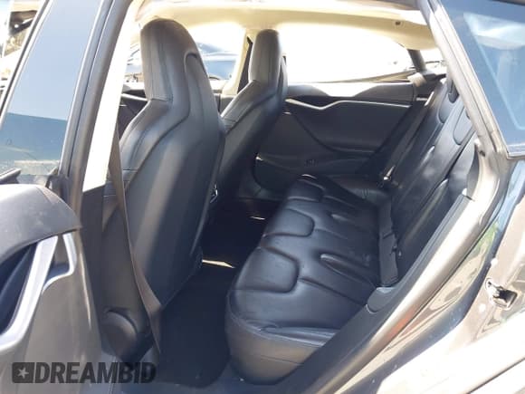 ✅ 2015 Tesla Model S 85 • VIN: 5YJSA1E18FF104436 • Lot: 42686314. Listed on IAAI with 179,459 mi. Free auction sales archive from the USA and detailed vehicle history report at DreamBid. Image 8.