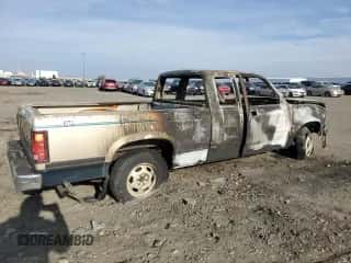 1993 Dodge Dakota с VIN 1B7FL23X8PS195883, выставлен на аукционе Copart как лот 42443235 с пробегом Не указан миль и Списание • Salvage title. История ставок и продаж доступна на DreamBid. Изображение 3.