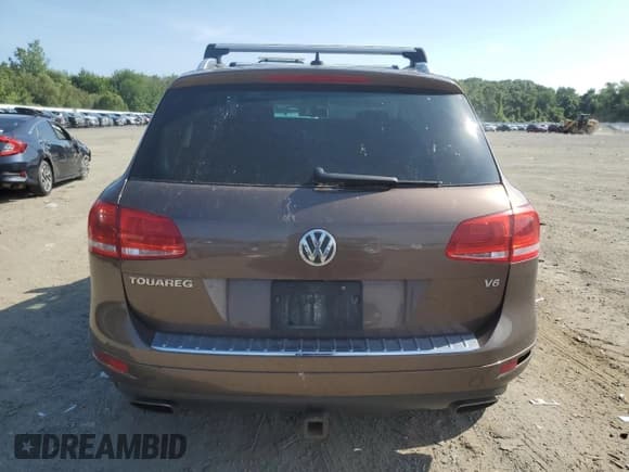 ✅ 2013 Volkswagen Touareg Lux • VIN: WVGEF9BP6DD013932 • Lot: 62047945. Listed on Copart with 127,821 mi. Free auction sales archive from the USA and detailed vehicle history report at DreamBid. Image 6.