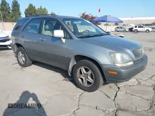 ✅ 2000 Lexus RX 300 • VIN: JT6HF10U8Y0157787 • Lot: 43880454. Listed on IAAI with 228,012 mi. Free auction sales archive from the USA and detailed vehicle history report at DreamBid. Image 1.