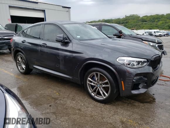 ✅ 2021 BMW X4 M40i • VIN: 5UX2V5C08M9E17162 • Lot: 67602073. Listed on Copart with 33,879 mi. Free auction sales archive from the USA and detailed vehicle history report at DreamBid. Image 4.