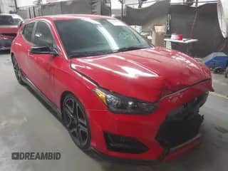 2020 Hyundai Veloster z VIN KMHT36AH6LU004297, wystawiony jako IAAI lot #42175069 z przebiegiem 88 955 mil mil oraz . Historia ofert i sprzedaży dostępna na DreamBid. Obrazek 1.