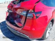 ✅ 2023 Tesla Model Y Long Range • VIN: 7SAYGDEE7PA102918 • Lot: 43596038. Listed on IAAI with 13,681 mi. Free auction sales archive from the USA and detailed vehicle history report at DreamBid. Image 22.