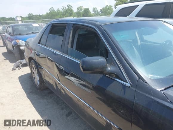 ✅ 2008 Cadillac DTS 1SC • VIN: 1G6KD57Y08U100077 • Lot: 42705218. Listed on IAAI with 219,650 mi. Free auction sales archive from the USA and detailed vehicle history report at DreamBid. Image 13.