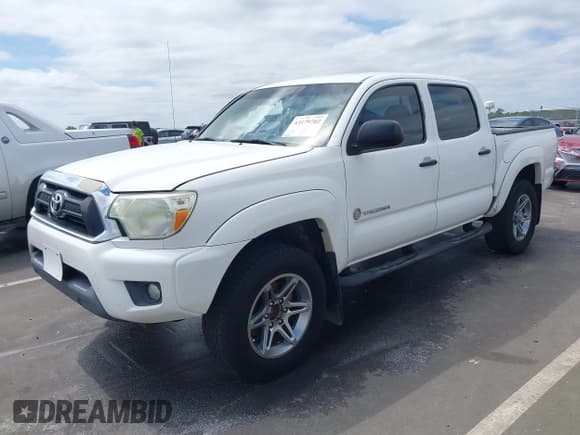 ✅ 2014 Toyota Tacoma PreRunner • VIN: 3TMJU4GN5EM161224 • Lot: 43179702. Listed on IAAI with 148,222 mi. Free auction sales archive from the USA and detailed vehicle history report at DreamBid. Image 17.