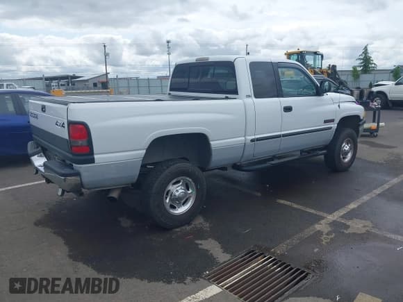 ✅ 2001 Dodge 2500 • VIN: 3B7KF23711G233829 • Lot: 42277336. Listed on IAAI with 206,695 mi. Free auction sales archive from the USA and detailed vehicle history report at DreamBid. Image 4.