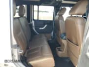 ✅ 2014 Jeep Wrangler Unlimited Sahara • VIN: 1C4BJWEG9EL108847 • Lot: 70563165. Wystawiony na Copart z przebiegiem 172 316 mil. Bezpłatny archiwum sprzedaży aukcyjnych z USA i szczegółowy raport historii pojazdu na DreamBid. Zdjęcie 11.