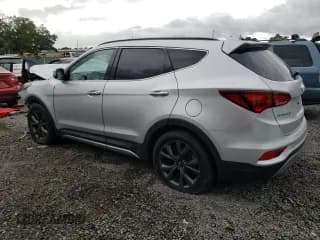 ✅ 2017 Hyundai Santa Fe Ultimate • VIN: 5XYZW4LA8HG471739 • Лот: 58624624. Опубликован ранее на Copart с пробегом 107 458 миль. Бесплатный доступ к архиву аукционных продаж из США и подробный отчёт об истории автомобиля на DreamBid. Изображение 2.