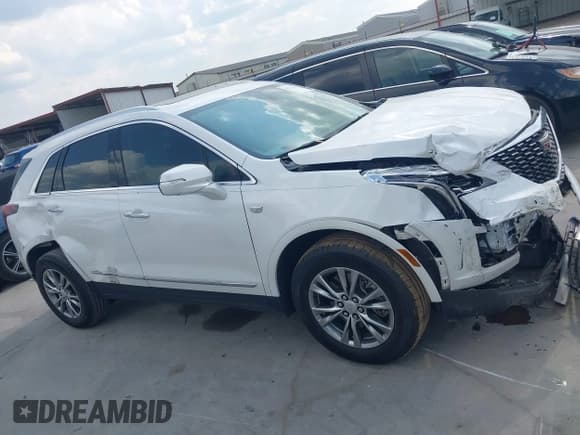 ✅ 2023 Cadillac XT5 FWD Premium Luxury • VIN: 1GYKNCR49PZ203017 • Лот: 43213013. Опубликован ранее на IAAI с пробегом 21 991 миль. Бесплатный доступ к архиву аукционных продаж из США и подробный отчёт об истории автомобиля на DreamBid. Изображение 13.