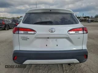 ✅ 2023 Toyota Corolla Cross LE • VIN: 7MUCAAAG5PV066486 • Lot: 94022955. Listed on Copart with 6,951 mi. Free auction sales archive from the USA and detailed vehicle history report at DreamBid. Image 6.