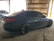 ✅ 2018 BMW M5 • VIN: WBSJF0C52JB283137 • Lot: 82362285. Listed on Copart with 69,963 mi. Free auction sales archive from the USA and detailed vehicle history report at DreamBid. Image 3.