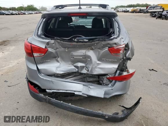 2013 Hyundai Tucson GLS z VIN KM8JU3AC6DU653140, wystawiony jako Copart lot #56669105 z przebiegiem 162 901 mil mil oraz Szkoda całkowita • Salvage title. Historia ofert i sprzedaży dostępna na DreamBid. Obrazek 6.