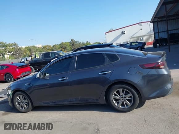 ✅ 2017 Kia Optima LX • VIN: 5XXGT4L14HG173077 • Lot: 42502823. Listed on IAAI with 114,047 mi. Free auction sales archive from the USA and detailed vehicle history report at DreamBid. Image 14.