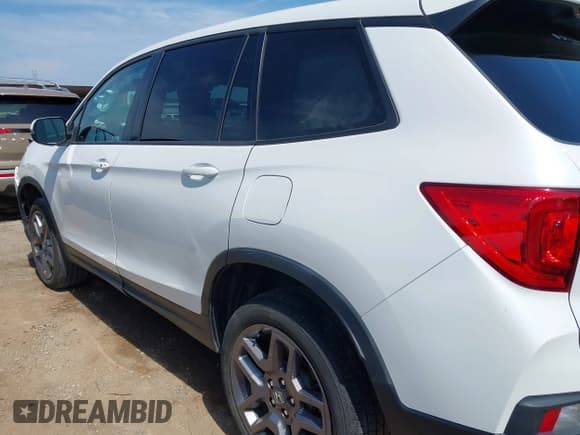✅ 2023 Honda Passport EX-L • VIN: 5FNYF8H53PB008136 • Lot: 42813797. Listed on IAAI with 26,970 mi. Free auction sales archive from the USA and detailed vehicle history report at DreamBid. Image 14.