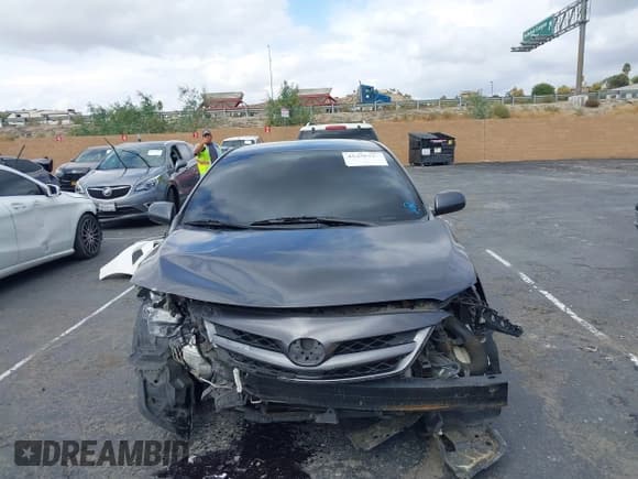 ✅ 2011 Toyota Corolla L • VIN: JTDBU4EE4B9154458 • Lot: 43438917. Listed on IAAI with 148,367 mi. Free auction sales archive from the USA and detailed vehicle history report at DreamBid. Image 12.
