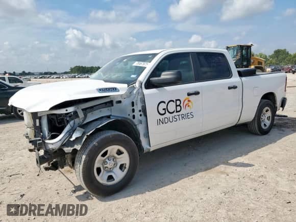 2023 Ram 1500 Tradesman z VIN 1C6RRENTXPN573635, wystawiony jako Copart lot #70497975 z przebiegiem 64 595 mil mil oraz Szkoda całkowita • Salvage title. Historia ofert i sprzedaży dostępna na DreamBid. Obrazek 1.