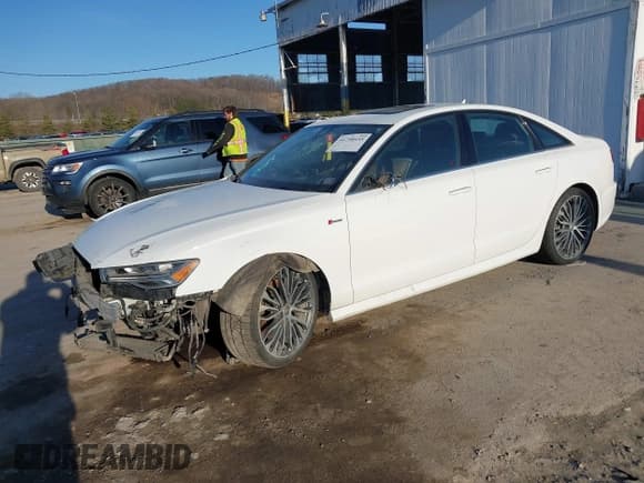 ✅ 2016 Audi A6 Prestige • VIN: WAUHGAFC2GN003319 • Lot: 41758455. Wystawiony na IAAI z przebiegiem 162 061 mil. Bezpłatny archiwum sprzedaży aukcyjnych z USA i szczegółowy raport historii pojazdu na DreamBid. Zdjęcie 2.