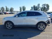 ✅ 2015 Lincoln MKC • VIN: 5LMTJ2AH6FUJ13553 • Lot: 43585464. Listed on IAAI with 136,864 mi. Free auction sales archive from the USA and detailed vehicle history report at DreamBid. Image 15.