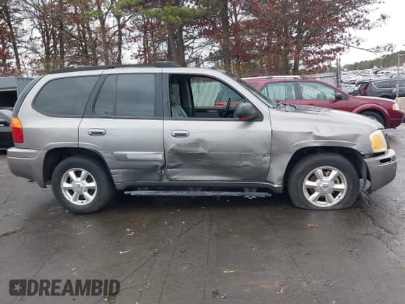 ✅ 2005 GMC Envoy SLE • VIN: 1GKDT13S852376893 • Лот: 43770021. Опубликован ранее на IAAI с пробегом 126 121 миль. Бесплатный доступ к архиву аукционных продаж из США и подробный отчёт об истории автомобиля на DreamBid. Изображение 6.