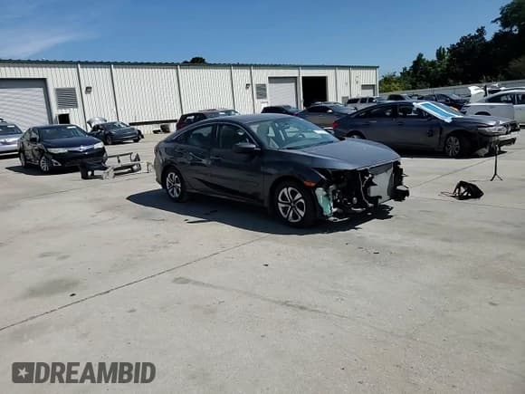 ✅ 2017 Honda Civic LX • VIN: 19XFC2F58HE231196 • Lot: 82138745. Wystawiony na Copart z przebiegiem 134 865 mil. Bezpłatny archiwum sprzedaży aukcyjnych z USA i szczegółowy raport historii pojazdu na DreamBid. Zdjęcie 14.