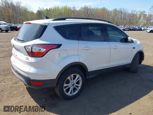 ✅ 2018 Ford Escape SEL • VIN: 1FMCU9HDXJUC25514 • Lot: 42092883. Listed on IAAI with 66,590 mi. Free auction sales archive from the USA and detailed vehicle history report at DreamBid. Image 4.