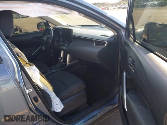 ✅ 2023 Toyota Corolla Cross LE • VIN: 7MUCAAAG7PV064903 • Lot: 43584375. Listed on IAAI with 28,011 mi. Free auction sales archive from the USA and detailed vehicle history report at DreamBid. Image 5.