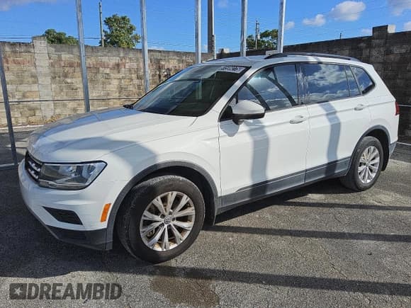 ✅ 2018 Volkswagen Tiguan S • VIN: 3VV1B7AX7JM081081 • Lot: 91599275. Listed on Copart with 56,400 mi. Free auction sales archive from the USA and detailed vehicle history report at DreamBid. Image 1.