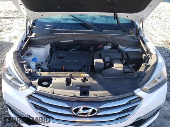 ✅ 2017 Hyundai Santa Fe 2.4L • VIN: 5NMZUDLB9HH033266 • Лот: 79764303. Опубликован ранее на Copart с пробегом 89 156 миль. Бесплатный доступ к архиву аукционных продаж из США и подробный отчёт об истории автомобиля на DreamBid. Изображение 11.