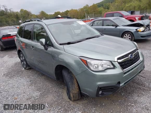 2018 Subaru Forester Limited with VIN JF2SJAJC7JH599214, listed as a IAAI auction lot 43324463 with 87,024 mi miles and . Bid and sale history available at DreamBid. Image 1.