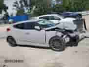 2013 Hyundai Veloster w/Gray Int z VIN KMHTC6AD0DU156798, wystawiony jako Copart lot #64678554 z przebiegiem 119 578 mil mil oraz Szkoda całkowita • Salvage title. Historia ofert i sprzedaży dostępna na DreamBid. Obrazek 4.