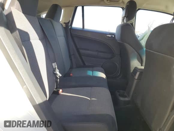 2010 Dodge Caliber SXT z VIN 1B3CB4HA9AD534833, wystawiony jako Copart lot #76404724 z przebiegiem 148 049 mil mil oraz Szkoda całkowita • Salvage title. Historia ofert i sprzedaży dostępna na DreamBid. Obrazek 12.