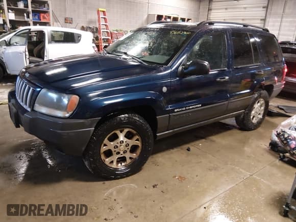 ✅ 2004 Jeep Grand Cherokee Laredo • VIN: 1J4GW48S64C428423 • Lot: 43682900. Listed on IAAI with 242,265 mi. Free auction sales archive from the USA and detailed vehicle history report at DreamBid. Image 2.