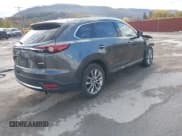 ✅ 2016 Mazda CX-9 Grand Touring • VIN: JM3TCBDY0G0106904 • Lot: 43592614. Wystawiony na IAAI z przebiegiem 103 048 mil. Bezpłatny archiwum sprzedaży aukcyjnych z USA i szczegółowy raport historii pojazdu na DreamBid. Zdjęcie 4.