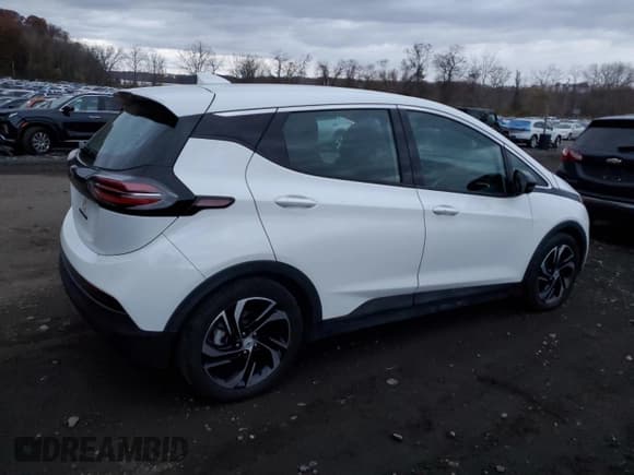 ✅ 2023 Chevrolet Bolt EV 2LT • VIN: 1G1FX6S00P4203889 • Lot: 92496605. Listed on Copart with 21,564 mi. Free auction sales archive from the USA and detailed vehicle history report at DreamBid. Image 3.