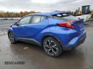 ✅ 2021 Toyota C-HR XLE • VIN: NMTKHMBX7MR122228 • Лот: 86479765. Опубликован ранее на Copart с пробегом 6 724 миль. Бесплатный доступ к архиву аукционных продаж из США и подробный отчёт об истории автомобиля на DreamBid. Изображение 2.