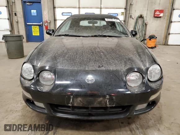 ✅ 1999 Toyota Celica GT • VIN: JT5FG02T7X0055063 • Lot: 83342194. Wystawiony na Copart z przebiegiem 166 871 mil. Bezpłatny archiwum sprzedaży aukcyjnych z USA i szczegółowy raport historii pojazdu na DreamBid. Zdjęcie 5.